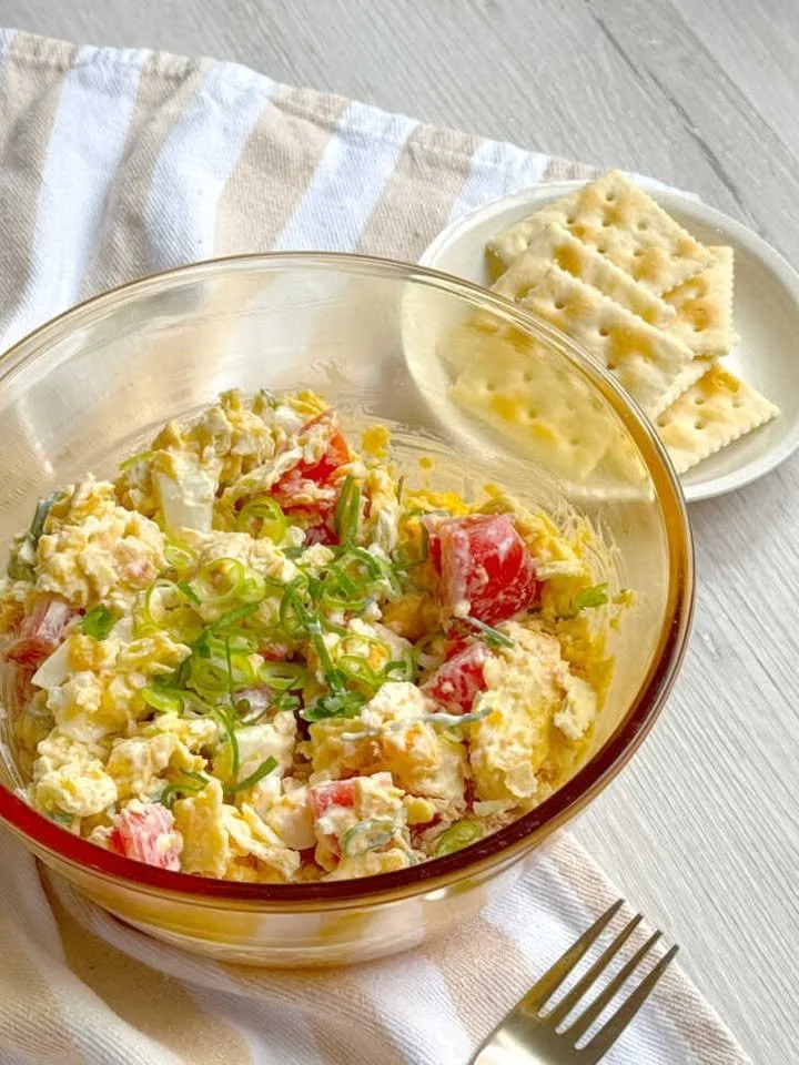 Aunt's Bridge Salad with colorful vegetables and creamy dressing in a bowl