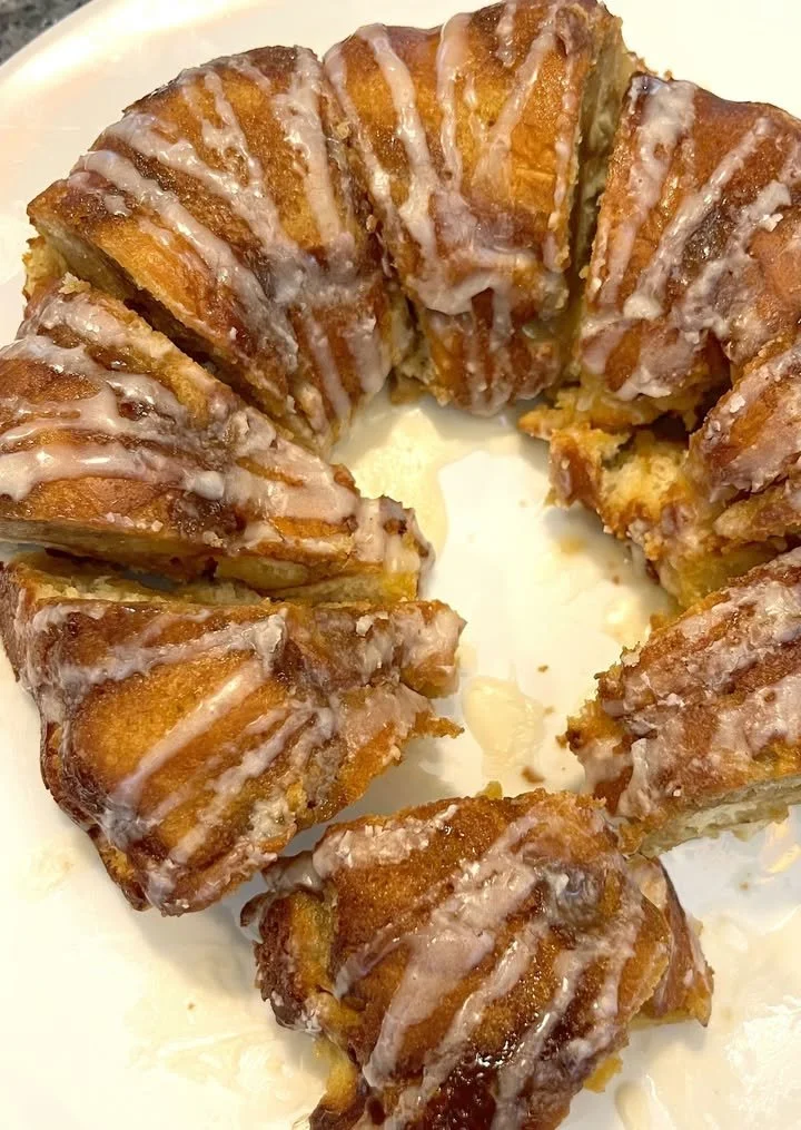 Delicious homemade banana cake with ripe bananas and creamy frosting.