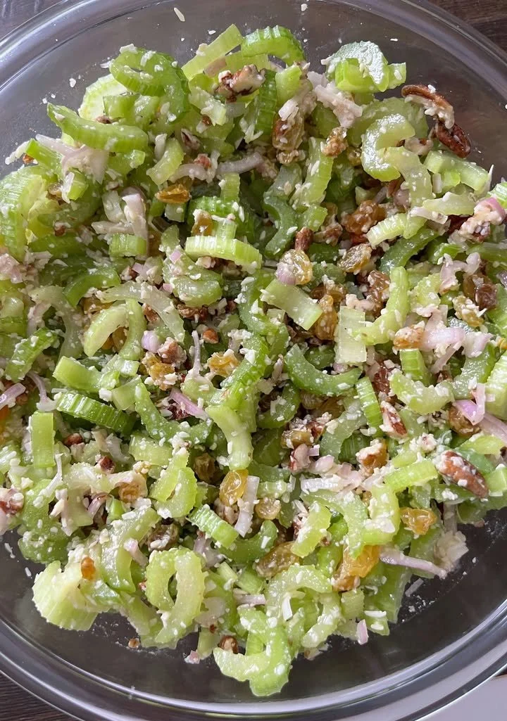 Fresh and crunchy celery salad with a colorful mix of vegetables.